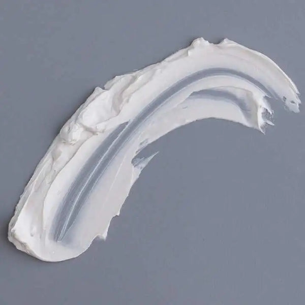 This is a clay mask image showing sample of clay mask against a gray background. this clay mask is used for hand and foot brightening 