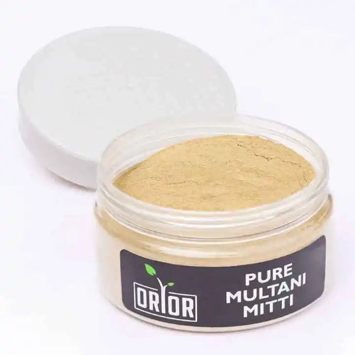 Multani Mitti is displayed against white backgroun with open lid